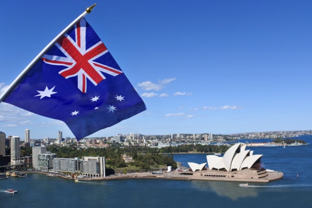 Australia’s national flag flies above the Sydney Opera House. Photo: Shutterstock
