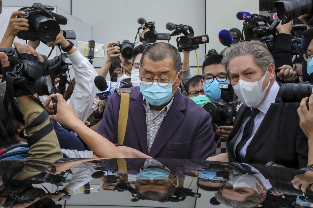 Media mogul Jimmy Lai (centre) outside Kowloon City police station in 2020. The tycoon is currently facing two conspiracy charges of collusion with foreign forces and another concerning sedition. Photo: Felix Wong
