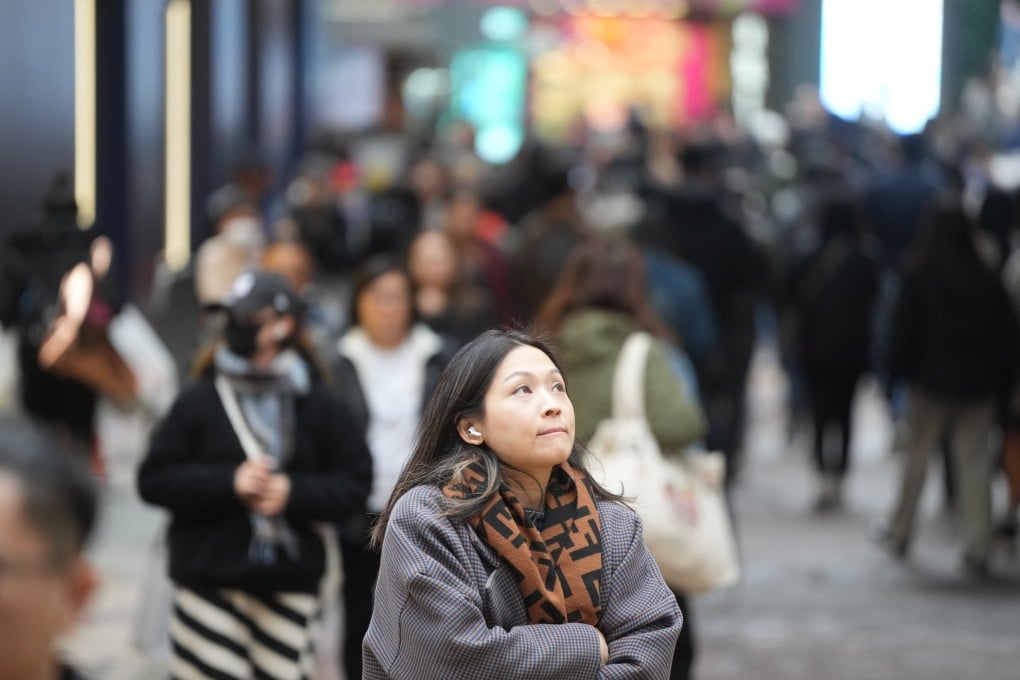 Pedestrians rug up amid cold weather earlier this month. Photo: Sam Tsang