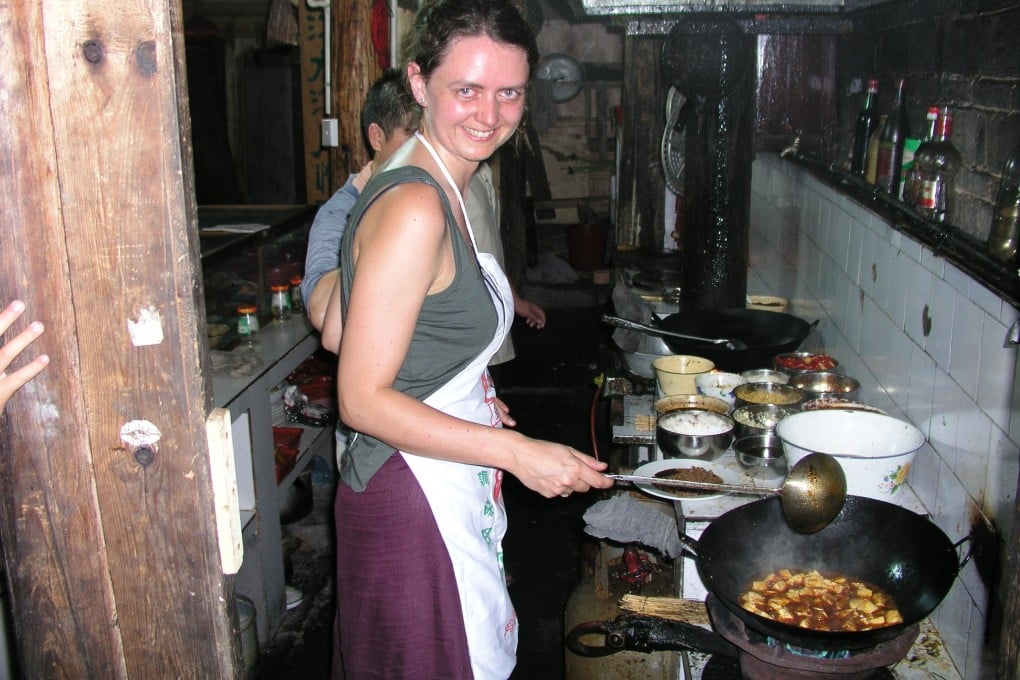 British cookbook author Fuchsia Dunlop cooking in Hunan in the early 200s. She opens up about her career spent introducing and demystifying regional Chinese cuisines to the English-speaking world.