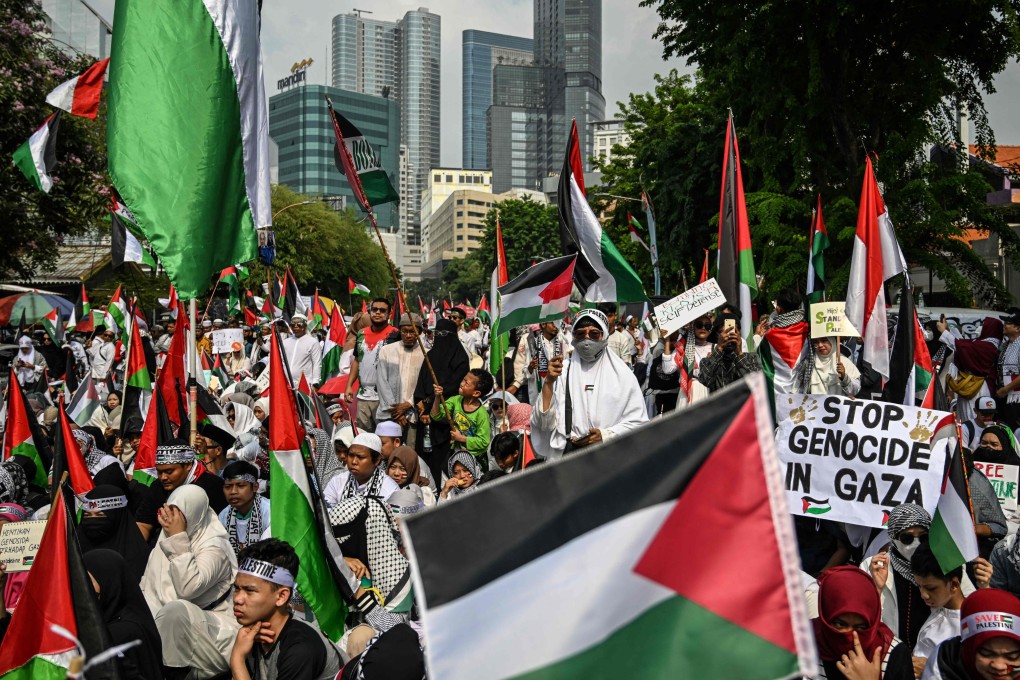 People take part in a mass rally in support of Palestinians in Surabaya, Indonesia, in November. Photo: AFP