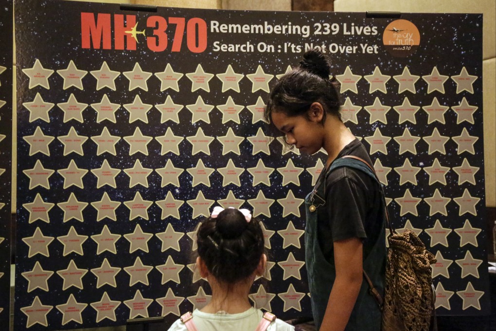 Relatives of missing MH370 passengers at a remembrance ceremony in Putrajaya, Malaysia, on March 7, 2020, to mark the sixth anniversary of the plane’s disappearance. The aircraft went missing on March 8, 2014. Photo: EPA-EFE