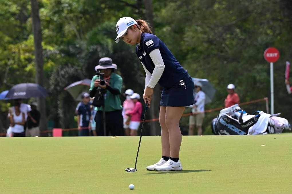 Ayaka Furue putts during the third round of the HSBC Women’s World Championship. Photo: AFP