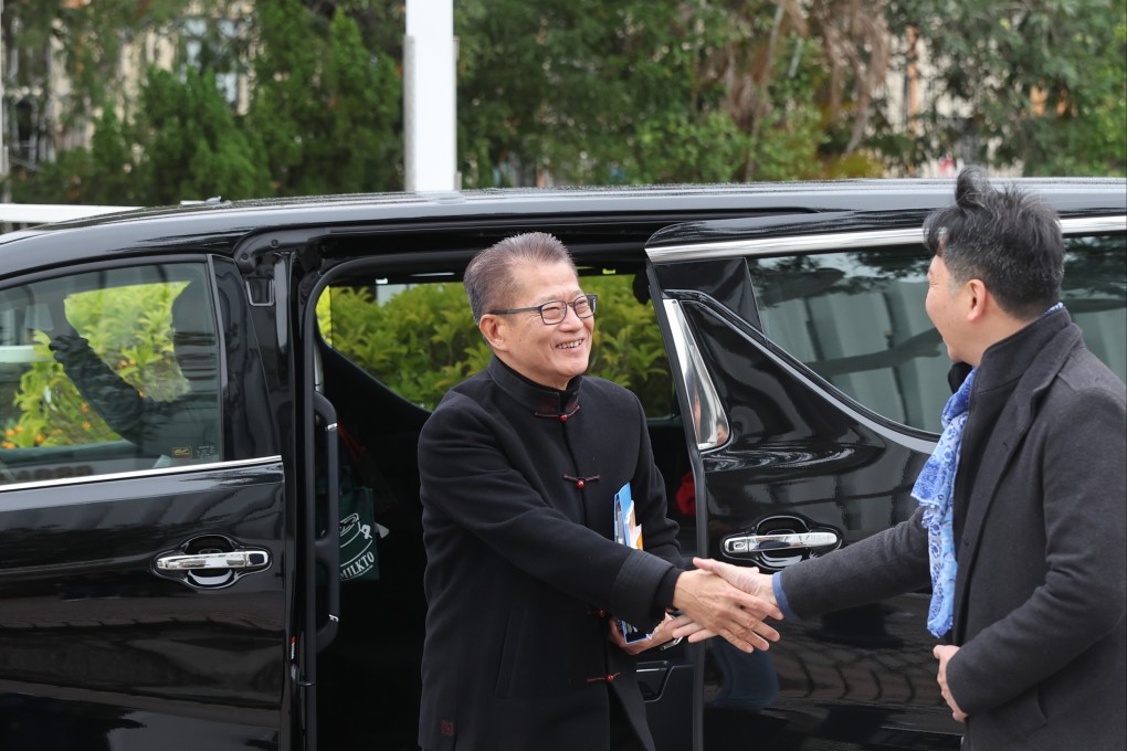 Financial Secretary Paul Chan arrives for a media interview. The finance chief said the government was borrowing over the next few years to plug a shortfall in public finances that would only be closed in the 2027-28 financial year. Photo: Edmond So