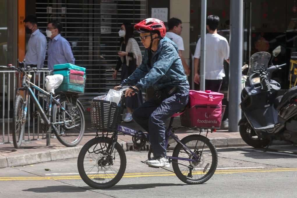 A food delivery worker in Wan Chai. Over 500 riders refused to do deliveries during the lunchtime peak period on February 26. Photo: Edmond So