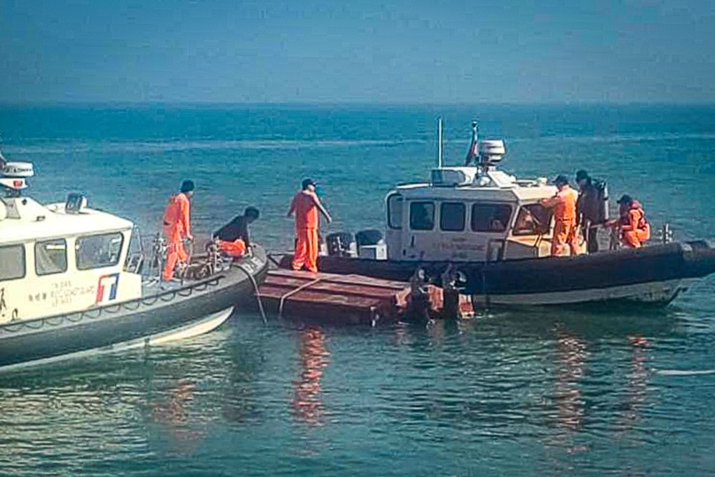 A speedboat carrying fishermen from mainland China capsizes after being chased by the Taiwanese coastguard near Quemoy on February 14, leaving two dead. Photo: Taiwan’s Coast Guard Administration