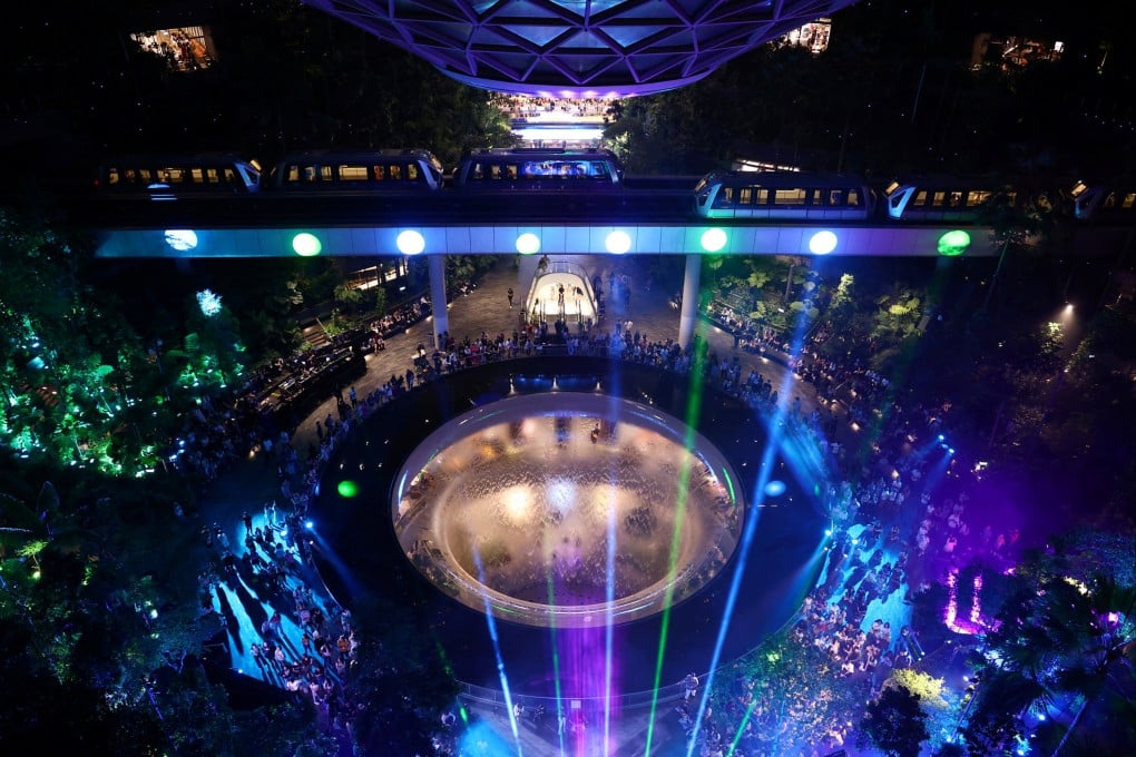 Fans of Taylor Swift gather for a sing-a-long ahead of her concerts at Jewel Changi Airport in Singapore on March 1. Photo: Reuters