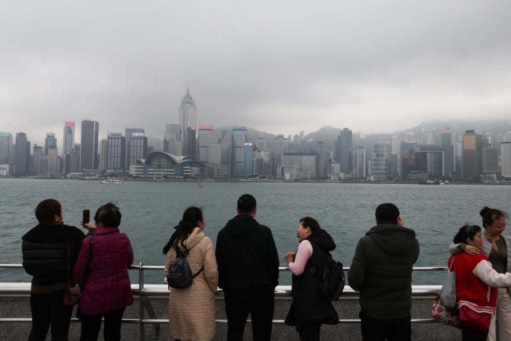 Tourists visit the Tsim Sha Tsui Harbour front. Photo: Jelly Tse