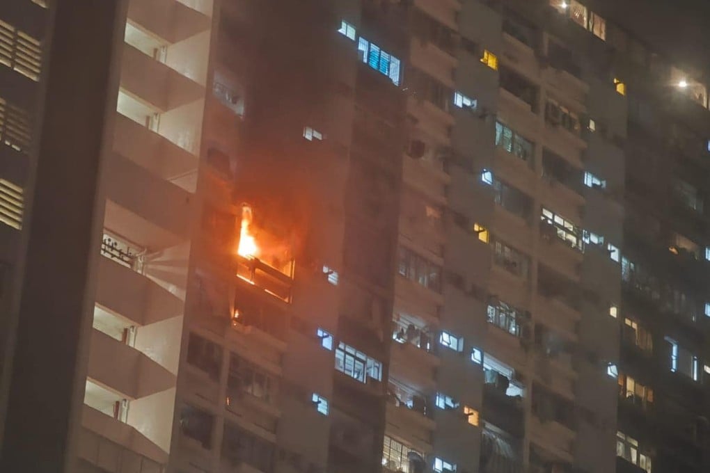 Shortly before 10pm, flames were seen shooting out the flat’s windows, accompanied by thick smoke, on the 21st floor of Tsuen Wing Lau at Lai Tak Estate in Tai Hang. Photo: Handout