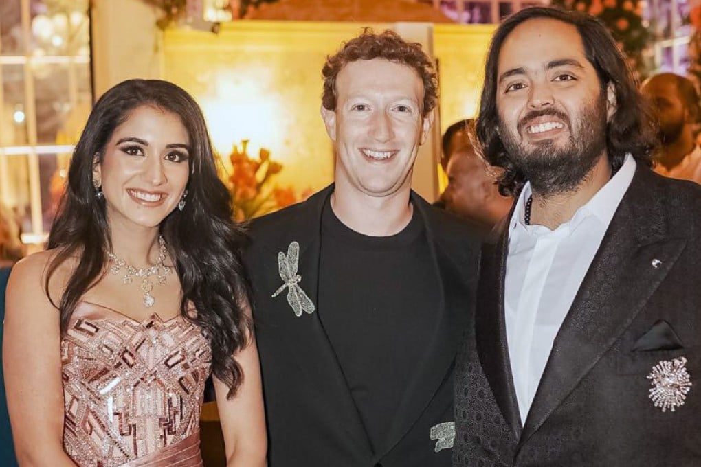 Mark Zuckerberg, centre, poses for a photograph with billionaire industrialist Mukesh Ambani’s son Anant Ambani, right, and Radhika Merchant at their pre-wedding bash in Jamnagar, India on Saturday. Photo: Reliance group via AP