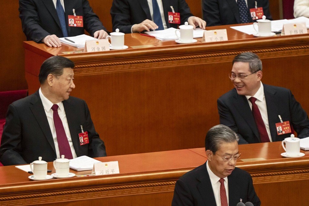President Xi Jinping (left) and Premier Li Qiang during the National People’s Congress in Beijing on Tuesday. Photo: Bloomberg