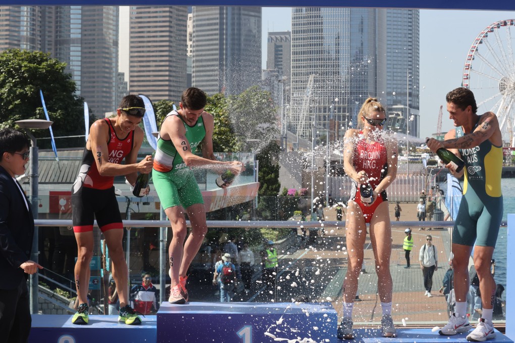 Men’s runner up Jason Ng (far left), winner James Edgar, women’s third place Bailee Brown, and men’s third place Lachlan Jones, at the Asia Triathlon Cup. Photo: Jonathan Wong