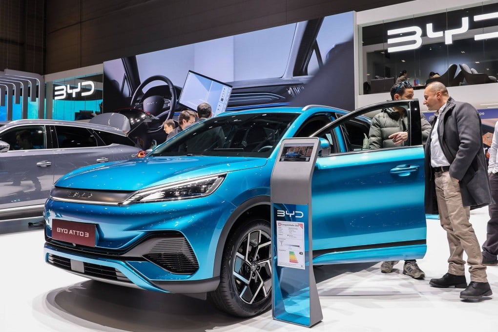 People check out a BYD Atto 3 electric vehicle at the Geneva International Motor Show in Switzerland, on February 27. The Chinese automaker’s SUV has received full marks for safety from European inspectors. Photo: Bloomberg