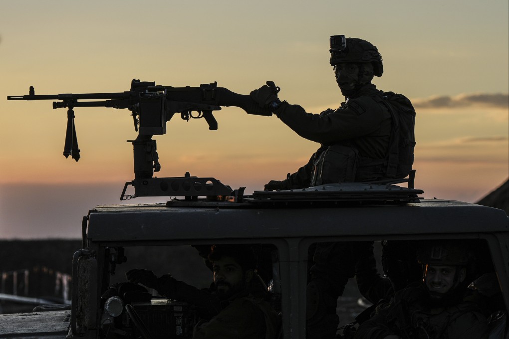 An Israeli soldier takes up position on the border with the Gaza Strip in southern Israel on January 29. Mediators are trying to agree on a ceasefire agreement before the Muslim holy month of Ramadan. Photo: AP