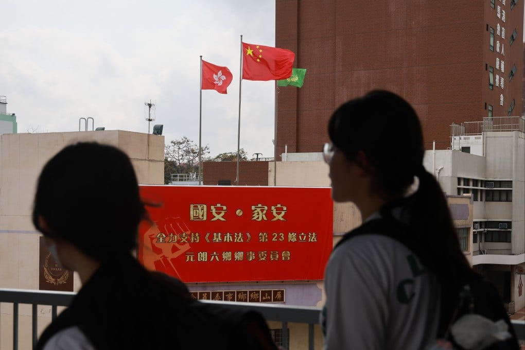 A banner hangs outside the Ping Shan Rural Committee Office in Yuen Long in support of Article 23 legislation. Authorities have proposed tougher penalties for certain security offences. Photo: May Tse