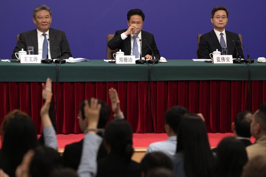 National Development and Reform Commission chief Zheng Shanjie (centre) said on Tuesday that China’s ambitious GDP growth goal for 2024 was “scientifically supported”. Photo: AP