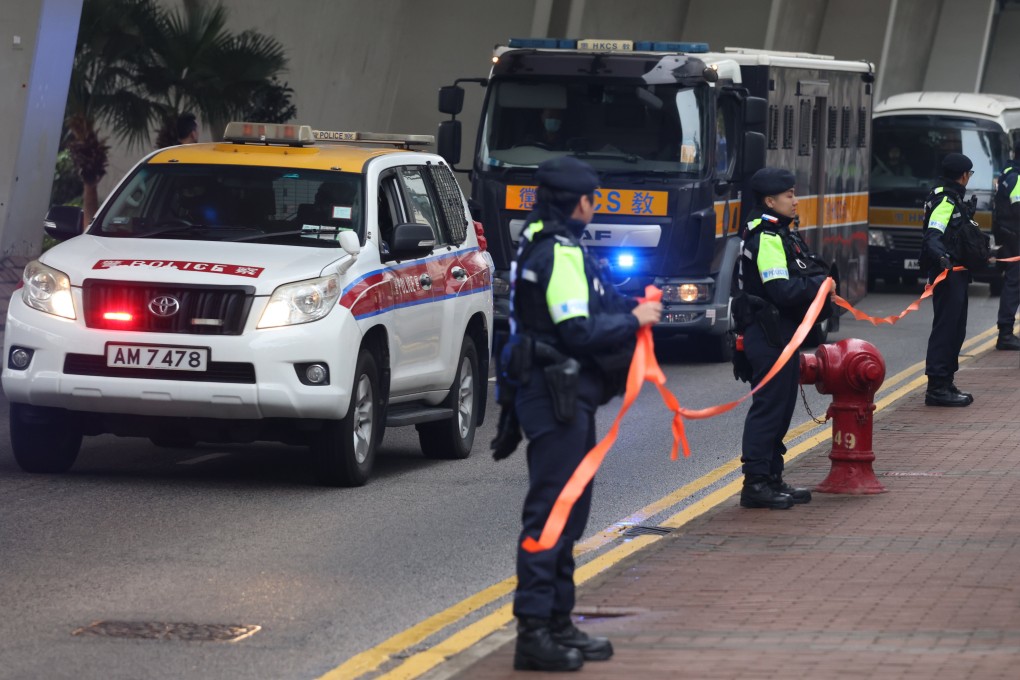 Former Apple Daily editorial writer Yeung Ching-kee, ferried to West Kowloon Court in a prison vehicle, is testifying for the prosecution. Photo: Yik Yeung-man