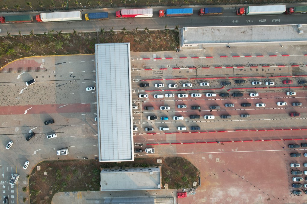 An aerial view of vehicles queuing for ferries to Hainan Island, China, on February 19, 2024. A limit on electric vehicles on ferries led to many drivers abandoning their vehicles on the island after Lunar New Year. Photo: Getty Images