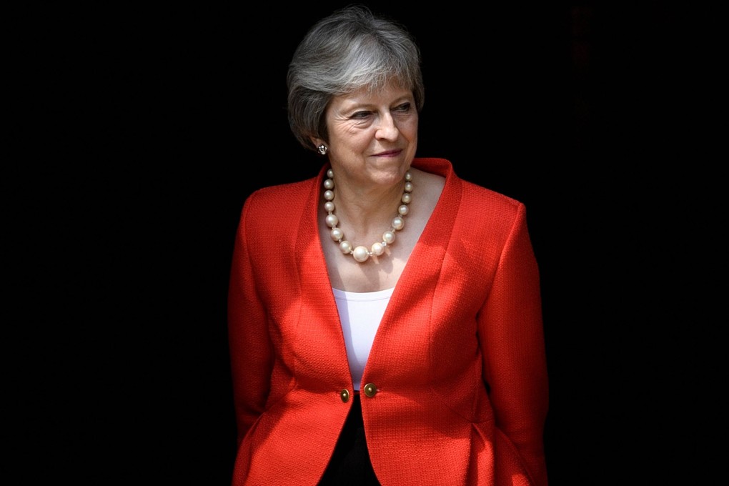 Britain’s former Prime Minister Theresa May announced that she will stand down as a member of parliament at the next general election, due to take place later this year. Photo: AFP