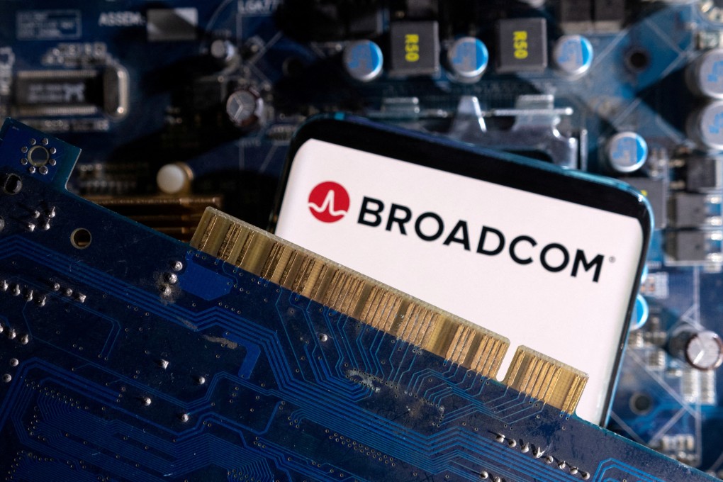 A smartphone displaying Broadcom's logo is placed on a computer motherboard in this illustration taken on March 6, 2023. Photo: Reuters