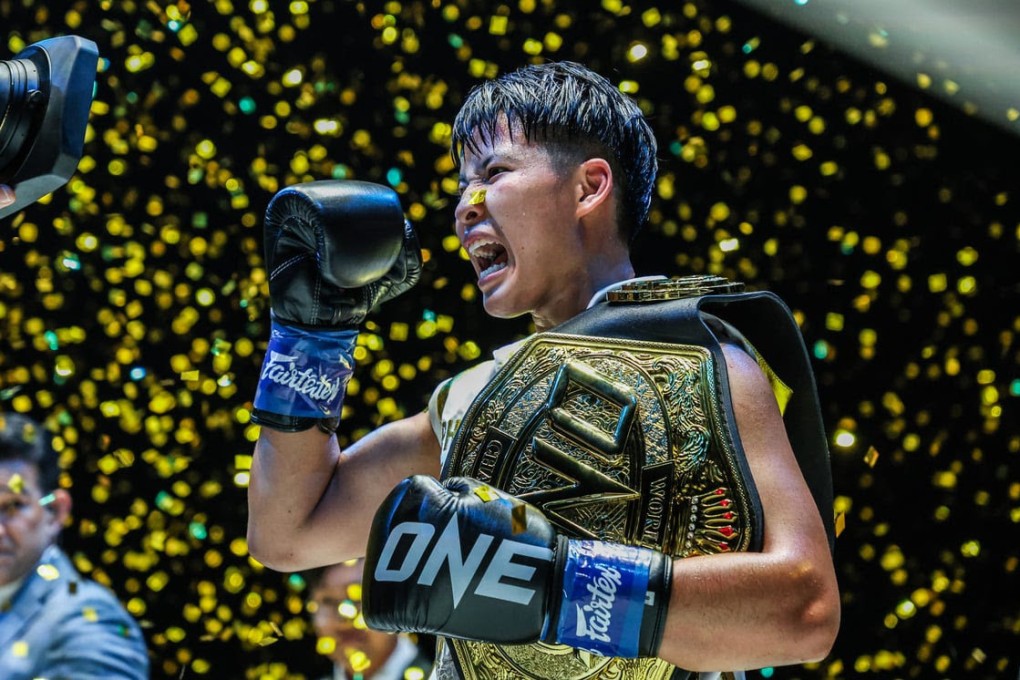 Phetjeeja Lukjaoporongtom celebrates winning her atomweight kickboxing belt unification bout against Janet Todd at ONE Fight Night 20.