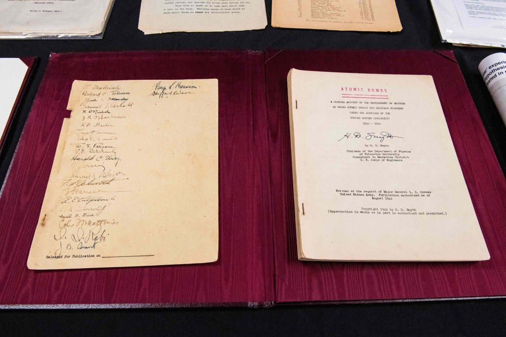 Items related to the US atomic bomb programme, some signed by J. Robert Oppenheimer and others, are displayed at the RR Auction House in Boston. Photo: AFP