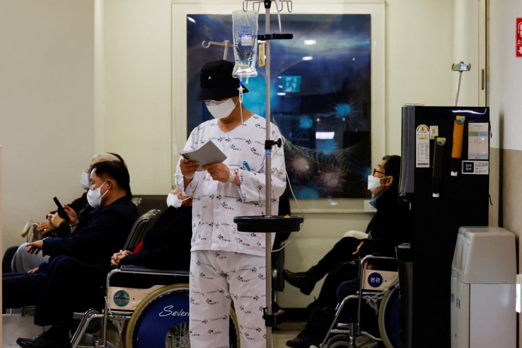 A patient stands at a hospital in Seoul, South Korea. Photo: Reuters