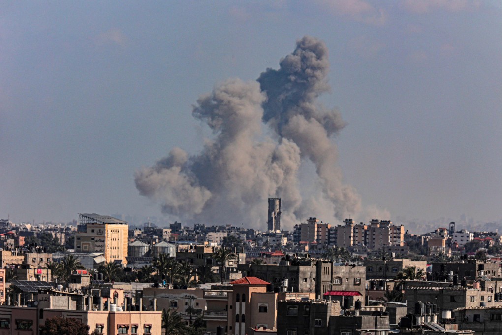 Smoke billowing over Khan Younis in the southern Gaza Strip during Israeli bombardment on Monday. Photo: AFP