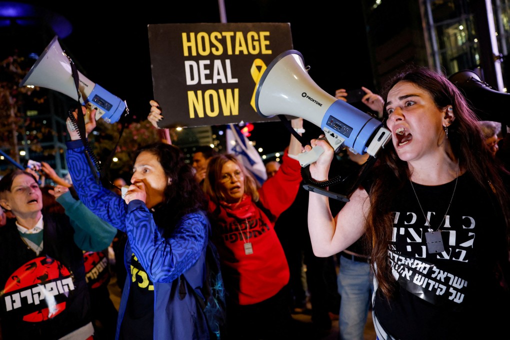 People take part in a protest against Israeli Prime Minister Benjamin Netanyahu’s government in Tel Aviv, Israel. Photo: Reuters