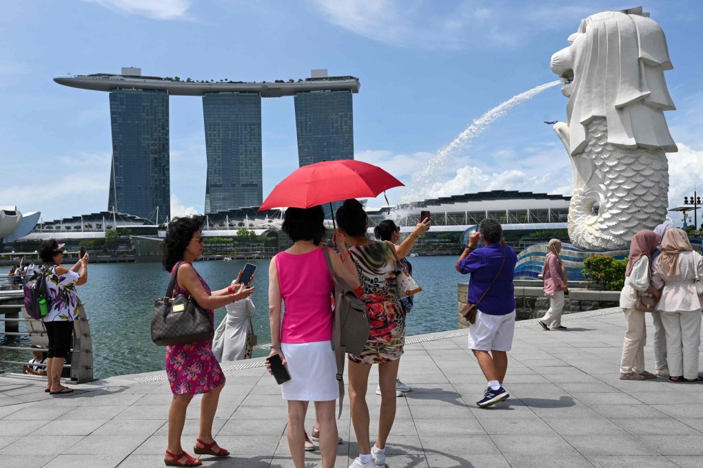 A Chinese tourist has been charged with trying to stage his own kidnapping while travelling in Singapore. Photo: AFP