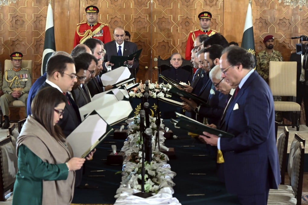 Pakistan’s President Asif Ali Zardari, centre left, administers the oath from federal ministers as Prime Minister Shehbaz Sharif, centre right, watches during a ceremony at the Presidential Palace, in Islamabad, Pakistan on Monday. Photo: Pakistan’s President Office via AP