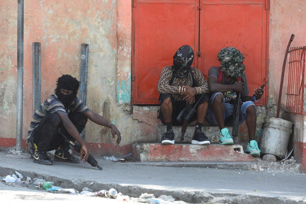 Armed gang members in Port-au-Prince, Haiti. Photo: Reuters