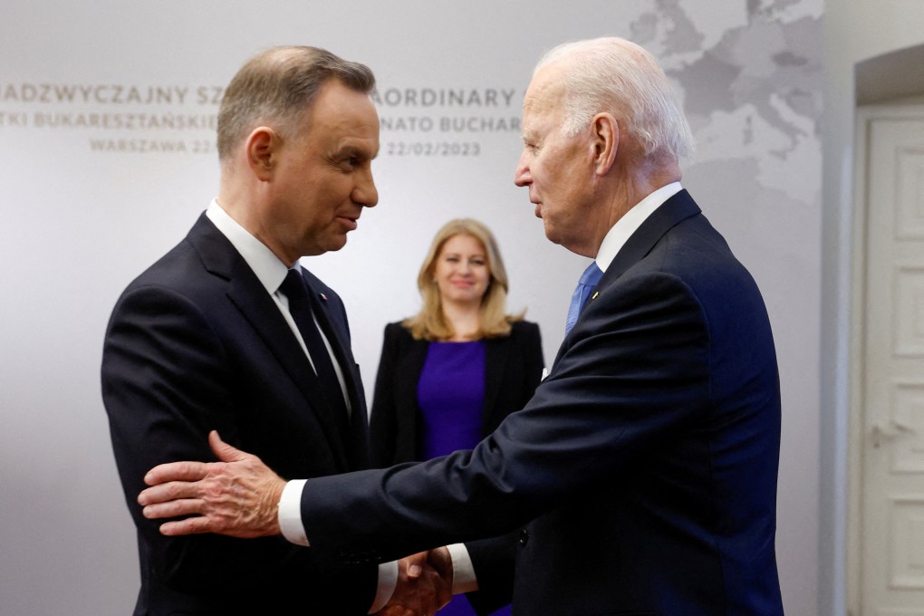 Poland’s President Andrzej Duda shakes hands with US President Joe Biden next to Slovakia’s President Zuzana Caputova, on the day of the Nato Bucharest Nine summit in February 2023. Photo: Reuters