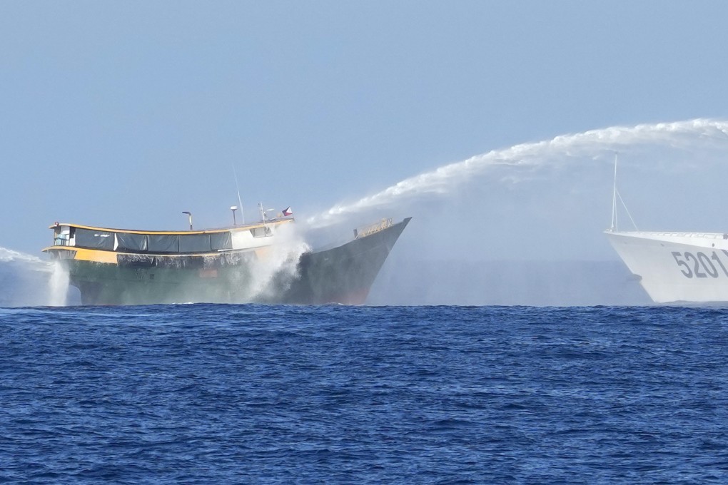 A Philippine resupply vessel is hit by Chinese coastguard water cannons as it tries to enter the Second Thomas Shoal on March 5. Photo: AP