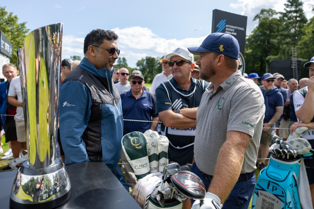 Rahul Singh, head of the International Series (left) and Graeme McDowell have a chat during an event in England. Photo: Asian Tour