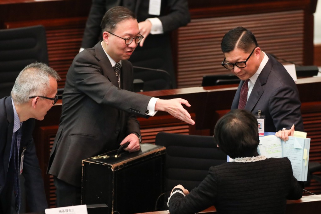 Secretary for Justice Paul Lam (second left)  and security chief Chris Tang Ping-keung (right) attend the bills committee meeting on Wednesday. Photo: Sun Yeung
