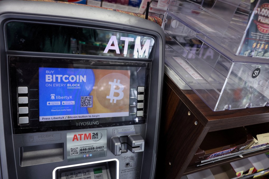 A bitcoin ATM sits in the corner of a store in New York on March 5. Bitcoin’s price has surged after US regulators allowed exchange-traded funds that track the spot price of the cryptocurrency, but there are also fears that increased mainstream appeal will bring calls for greater regulation. Photo: Reuters