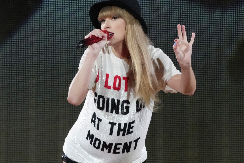 Taylor Swift performs onstage during her Eras tour in 2023 in California. Graphic T-shirts like the one she is wearing here can often pack a political or social punch even when they are not intended to by their designers. Photo: Getty Images