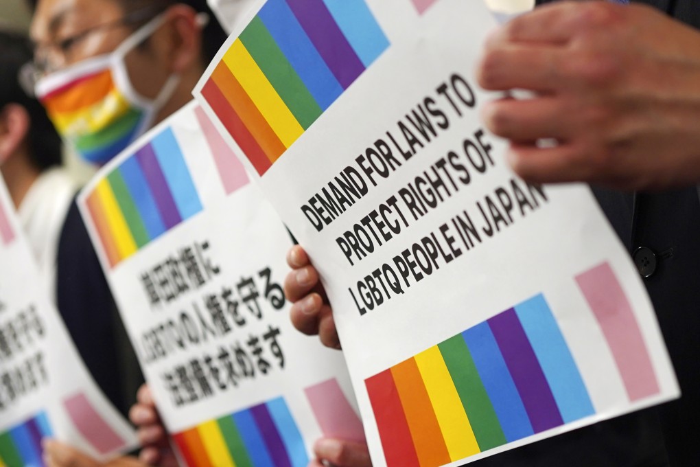 Representatives of Japanese LGBTQ people and rights groups protest on February 7. On Thursday, Japan’s high court says same-sex marriage bar is unconstitutional. Photo: AP