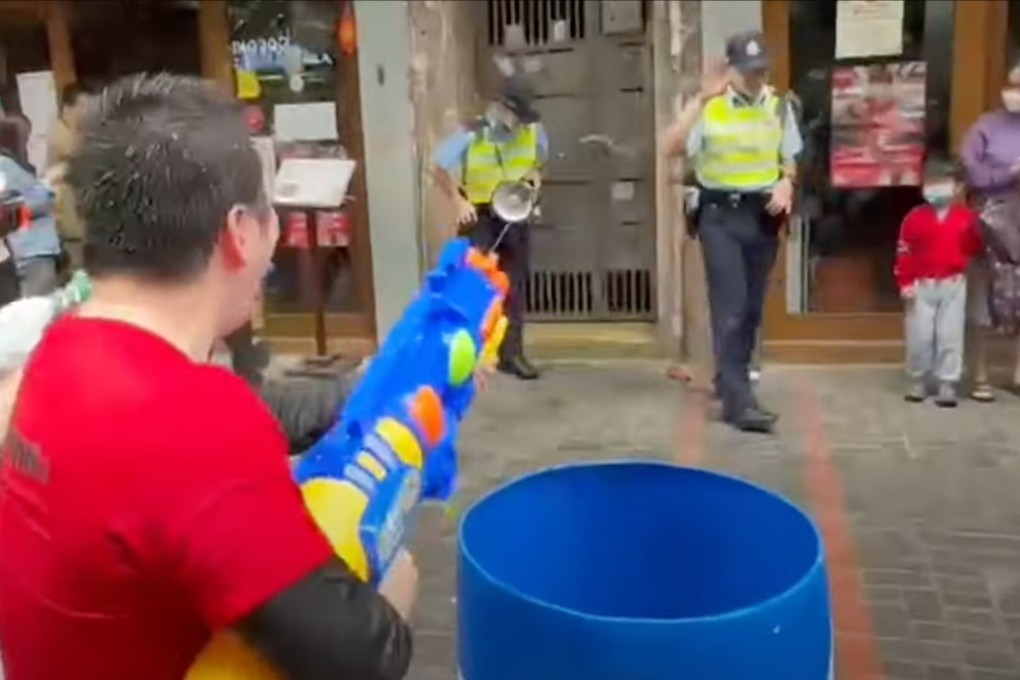 Three men have pleaded not guilty to soaking police officers with water at a Thai new year event last year. Photo: Youtube @Bravedogdog