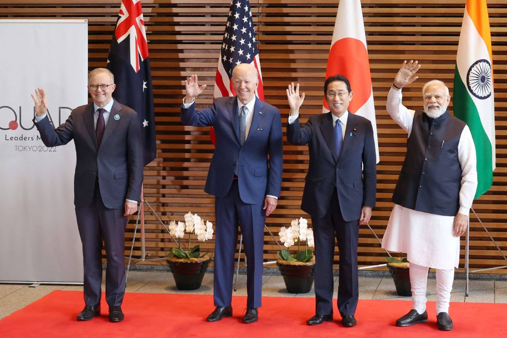 (Left to right) Australian Prime Minister Anthony Albanese, US President Joe Biden, Japanese Prime Minister Fumio Kishida and Indian Prime Minister Narendra Modi wave to the media before the Quad meeting at the Kishida’s office in Tokyo on May 24, 2022. Photo: AFP