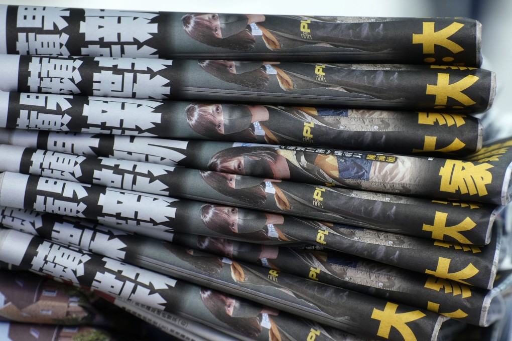 Copies of Apple Daily at a newspaper stand. The now-closed tabloid approved the use of Margaret Thatcher photo for an activist’s campaign. Photo: AP