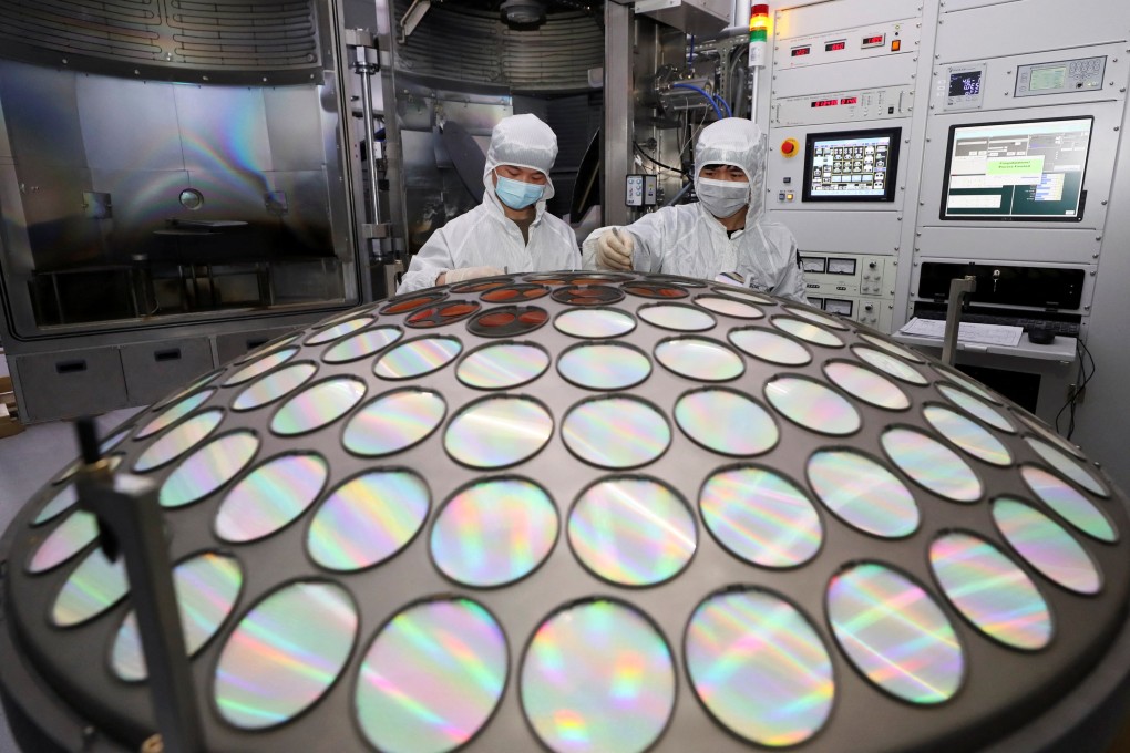 Employees work on the semiconductor chip production line at Jiangsu Azure Corp in Huaian, Jiangsu province, in March 2022. Photo: China Daily via Reuters