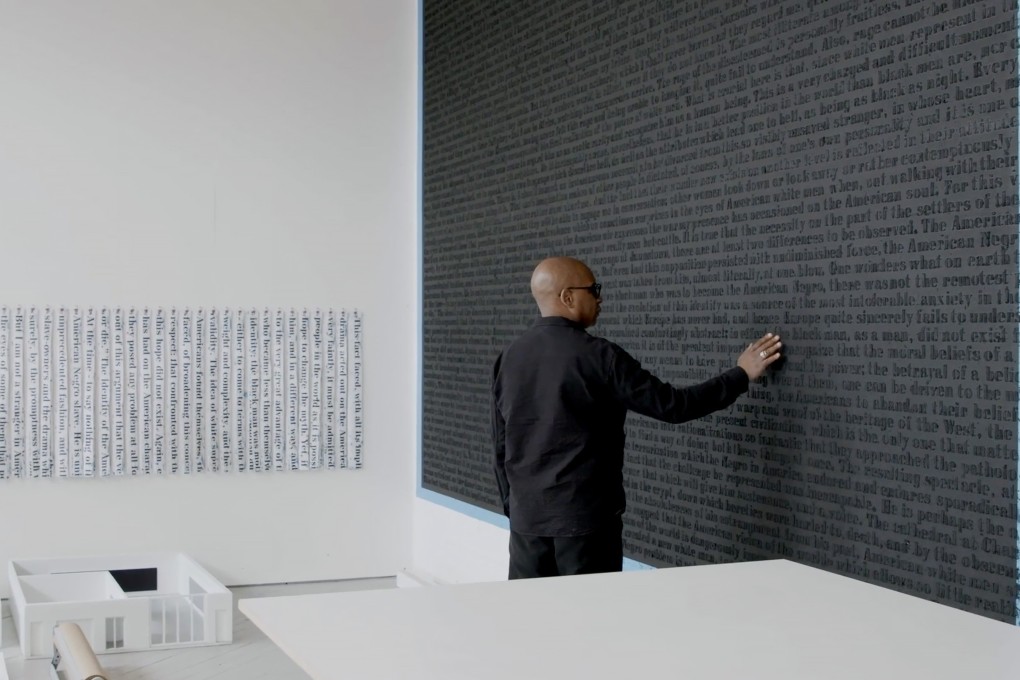US conceptual artist Glenn Ligon in front of one of his works, which feature text painted over to render it illegible. Hauser & Wirth’s Hong Kong gallery is staging the first solo show of Ligon’s work in Greater China. Photo: Glenn Ligon/Hauser & Wirth