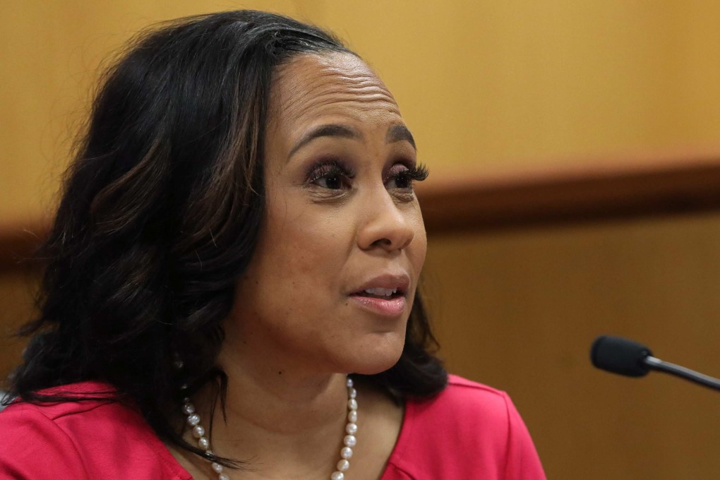A judge ruled that Fulton County District Attorney Fani Willis, who brought 2020 election interference charges against former US President Donald Trump, can remain on the case if her lead prosecutor, Nathan Wade, with whom she had a romantic relationship, steps aside. Photo: AFP