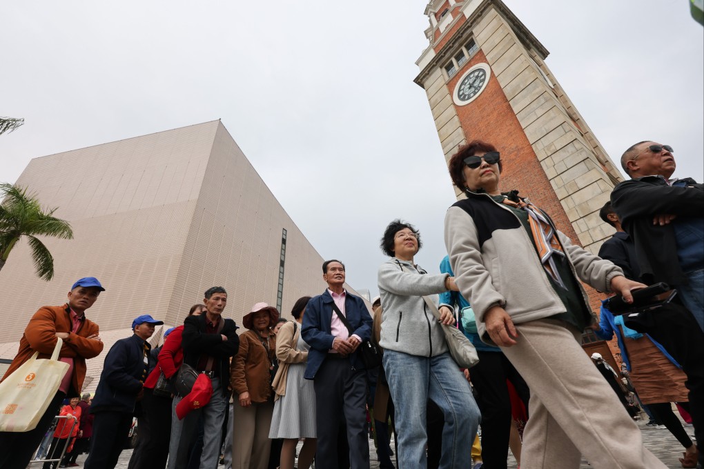 Tourists in Tsim Sha Tsui. Visitors from two cities will be gifted an Octopus Card, an internet SIM card and a travel adaptor as “three must-haves” for their stay in Hong Kong. Photo: Jelly Tse