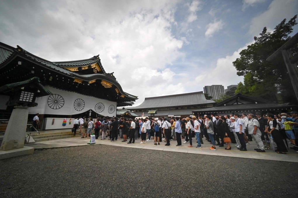 People pray at Yasukuni Shrine in Tokyo. Photo: AFP