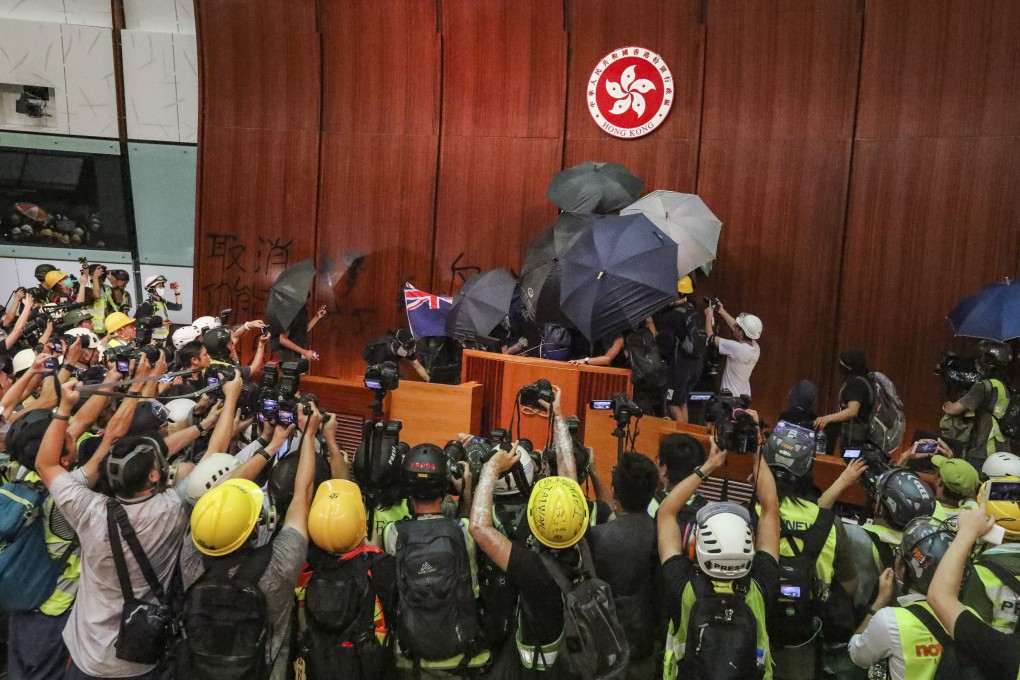 Political activists at the Legislative Council complex in 2019. Hong Kong authorities expressed disapproval over a BBC report covering the sentencing of activists over the incident. Photo: Felix Wong