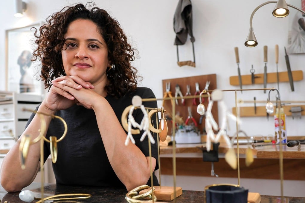 Kenyan designer Ami Doshi Shah with some of her eclectic jewellery pieces at her home studio, where she uses locally sourced raw materials including rope and salt crystals as well as brass and semi-precious stones. Photo: AFP