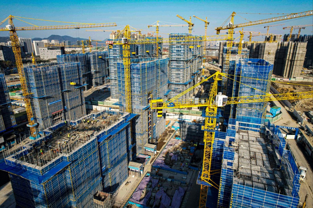 An aerial view shows residential buildings under construction by Chinese real estate developer Vanke in Hangzhou, in eastern China’s Zhejiang province, on March 15, 2024. Photo: AFP